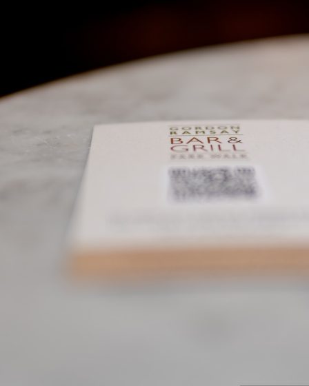 white and brown paper on gray table